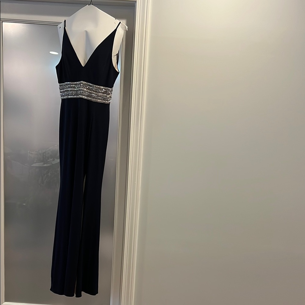 Xscape Black Backless Dress with Silver Accents